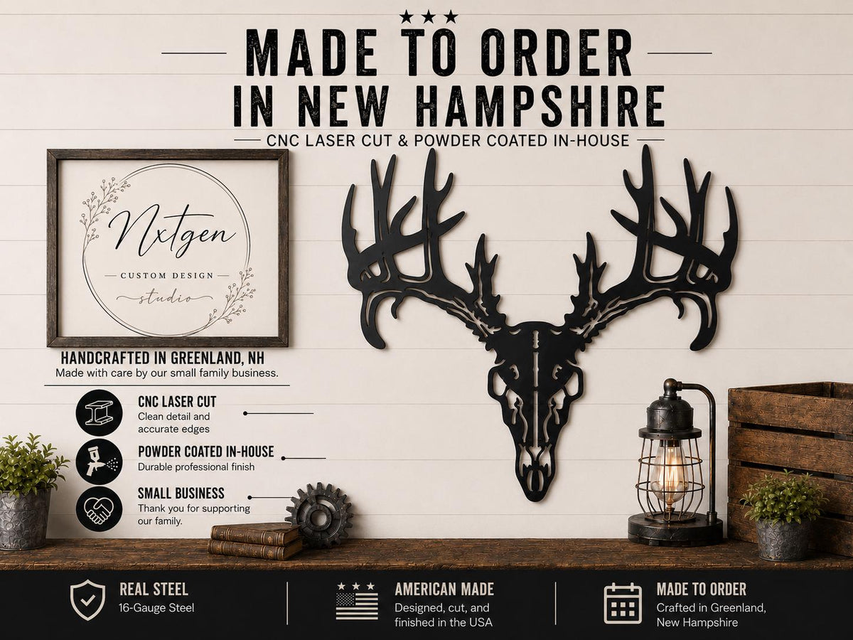 A black metal deer skull with large antlers mounted on a rustic wood wall, shown in a styled interior scene with a lantern, books, and plants. Large text at the top reads 'MADE TO ORDER IN NEW HAMPSHIRE' and the logo on the left says 'Nixten Custom Design Studio.