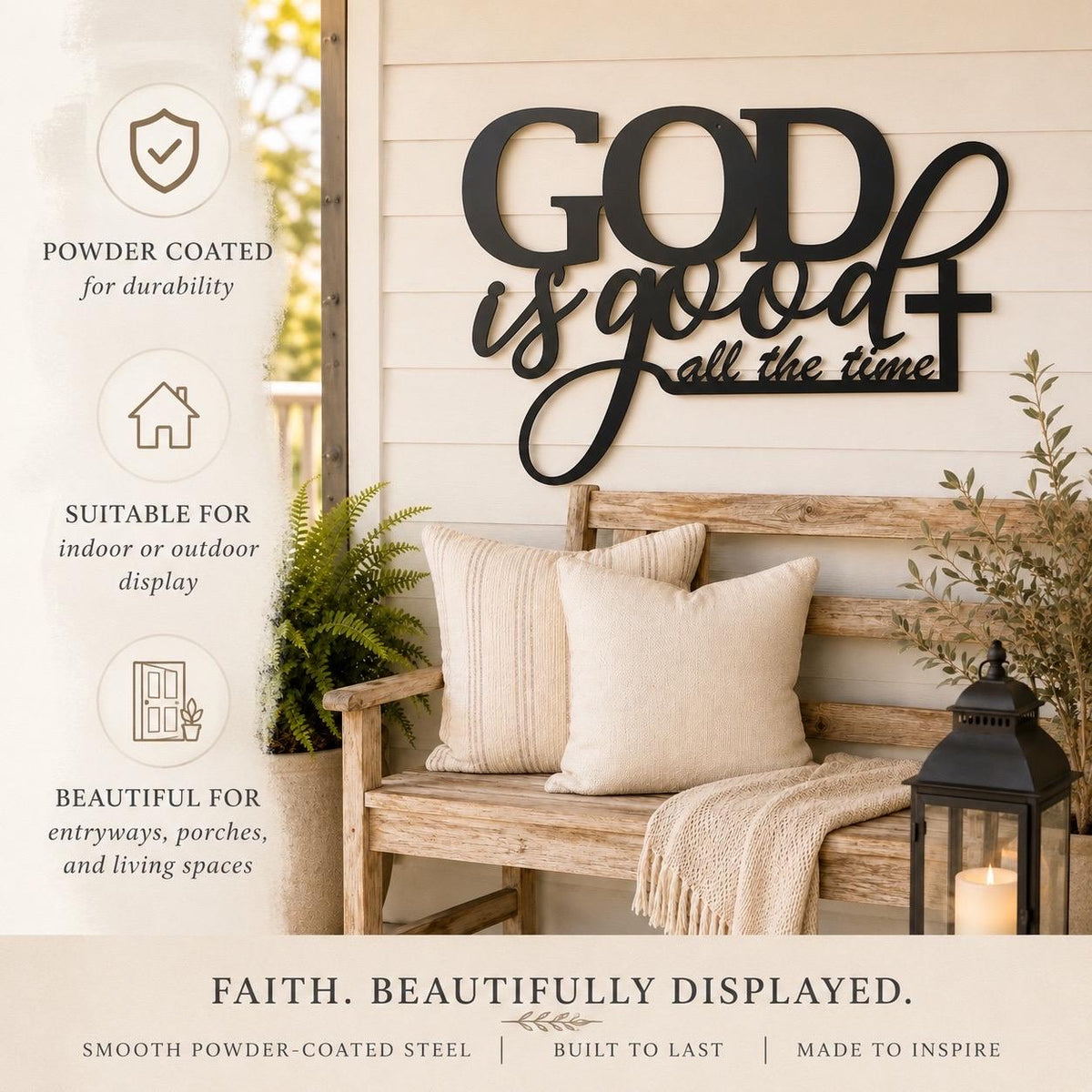 Black metal wall decor sign reading 'GOD is good all the time' mounted on a beige wood-paneled wall above a rustic wooden bench with cream pillows and a throw blanket. Text on the left highlights powder-coated durability, indoor/outdoor suitability, and appeal for entryways, porches, and living spaces.