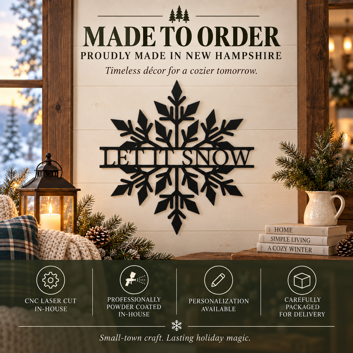 A decorative wall sign reading “LET IT SNOW” in a black metal cutout style, mounted on a light wood plank wall. The scene is styled for holiday decor with a lantern, candles, books, pine branches, and a mug.