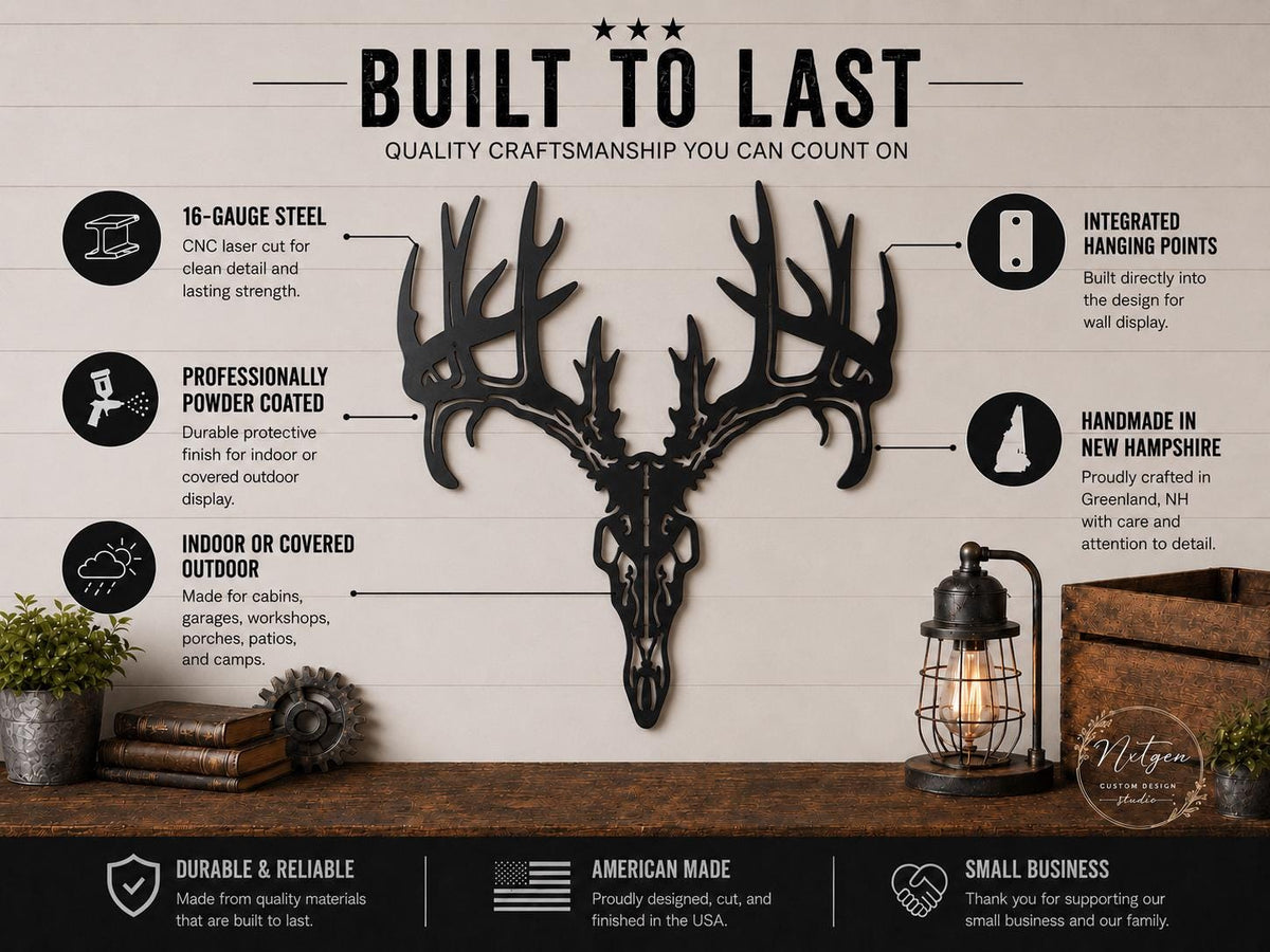 A black metal deer skull wall hanging with antlers, shown mounted on a light wood wall in a styled interior scene. The image includes text callouts describing features such as 16-gauge steel, powder coating, indoor or covered outdoor use, integrated hanging points, and handmade in New Hampshire.