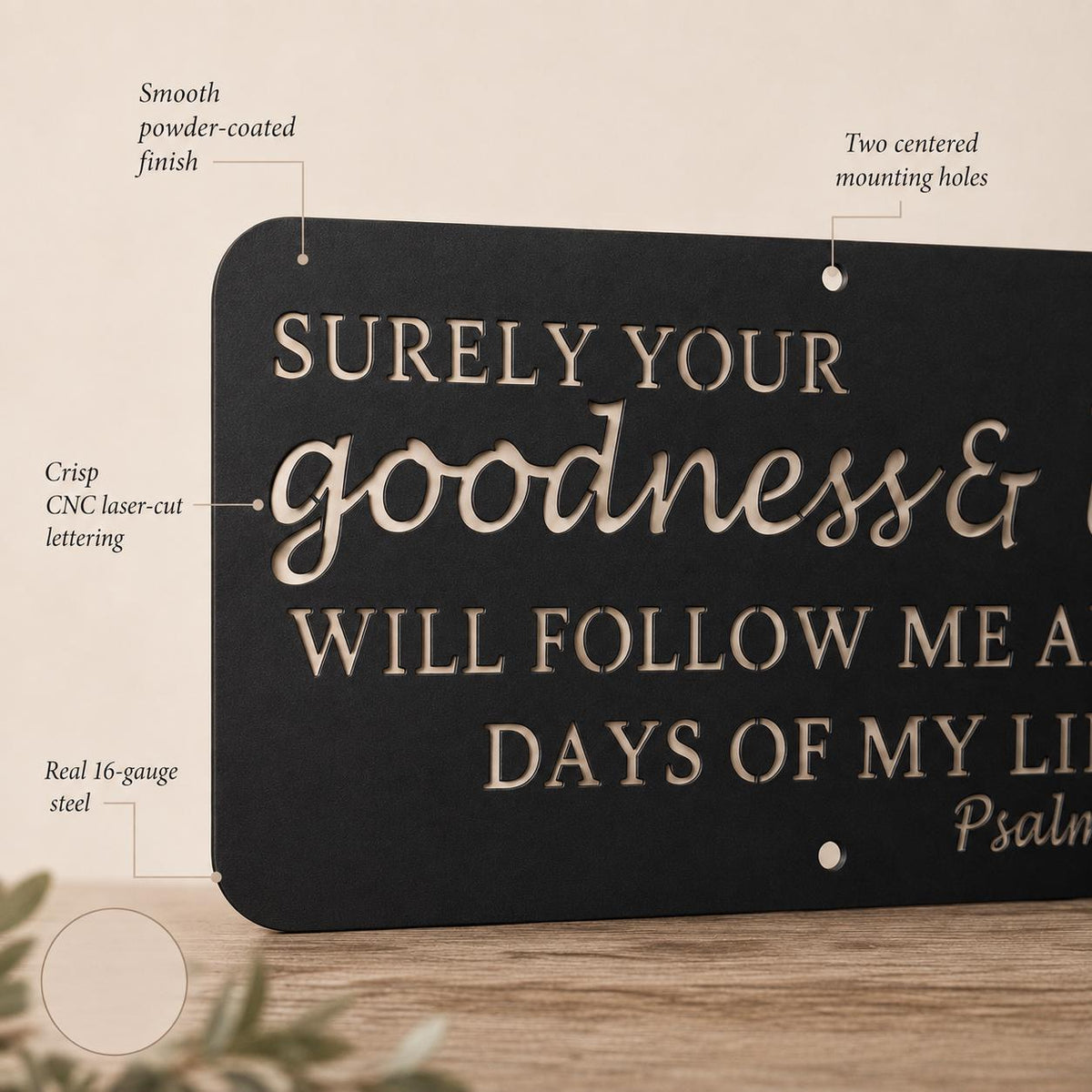A black metal sign with laser-cut gold lettering that reads 'SURELY YOUR goodness & grace WILL FOLLOW ME THROUGH DAYS OF MY LIFE Psalm.