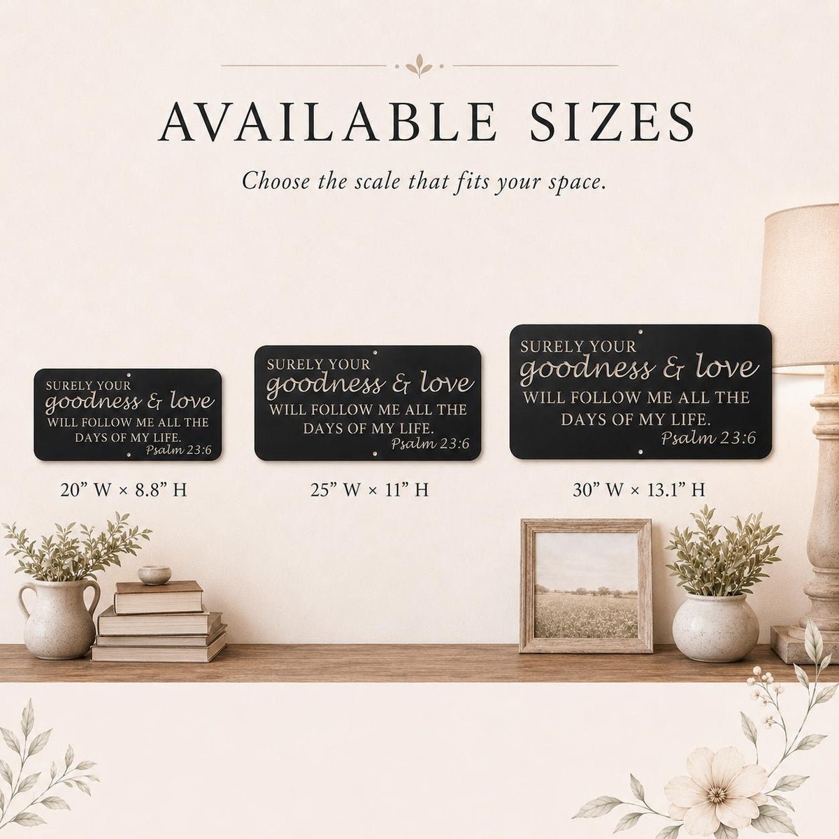 Three black decorative wall signs with white scripture text are shown on a shelf in a styled room scene, with text above reading 'AVAILABLE SIZES' and size labels beneath each sign: 20" x 8.8" H, 25" x 11" H, and 30" x 13.